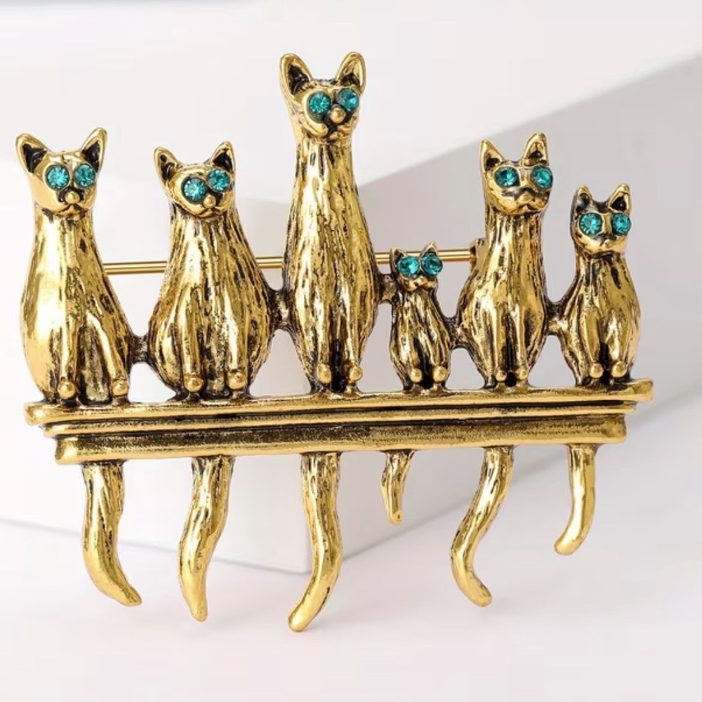 Gold Cat Brooch with Blue Accents